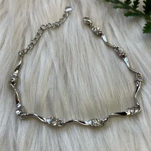 Faceted rhinestones silver tone bracelet